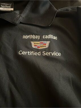 Nike Black Polo with Embroidered Cadillac Crest
